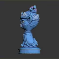Blue Cat Sculpture With Pink Accents And Detailed Decorative Design On Base